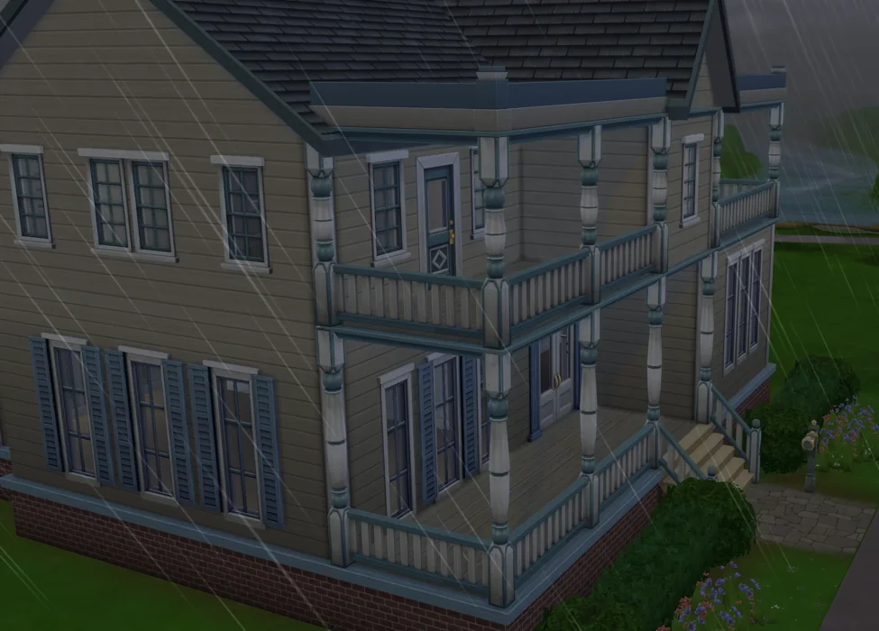 The Victorian house in The Sims 4, on a rainy day